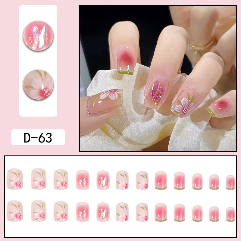 Elegant pink press-on nails with adhesive tabs
